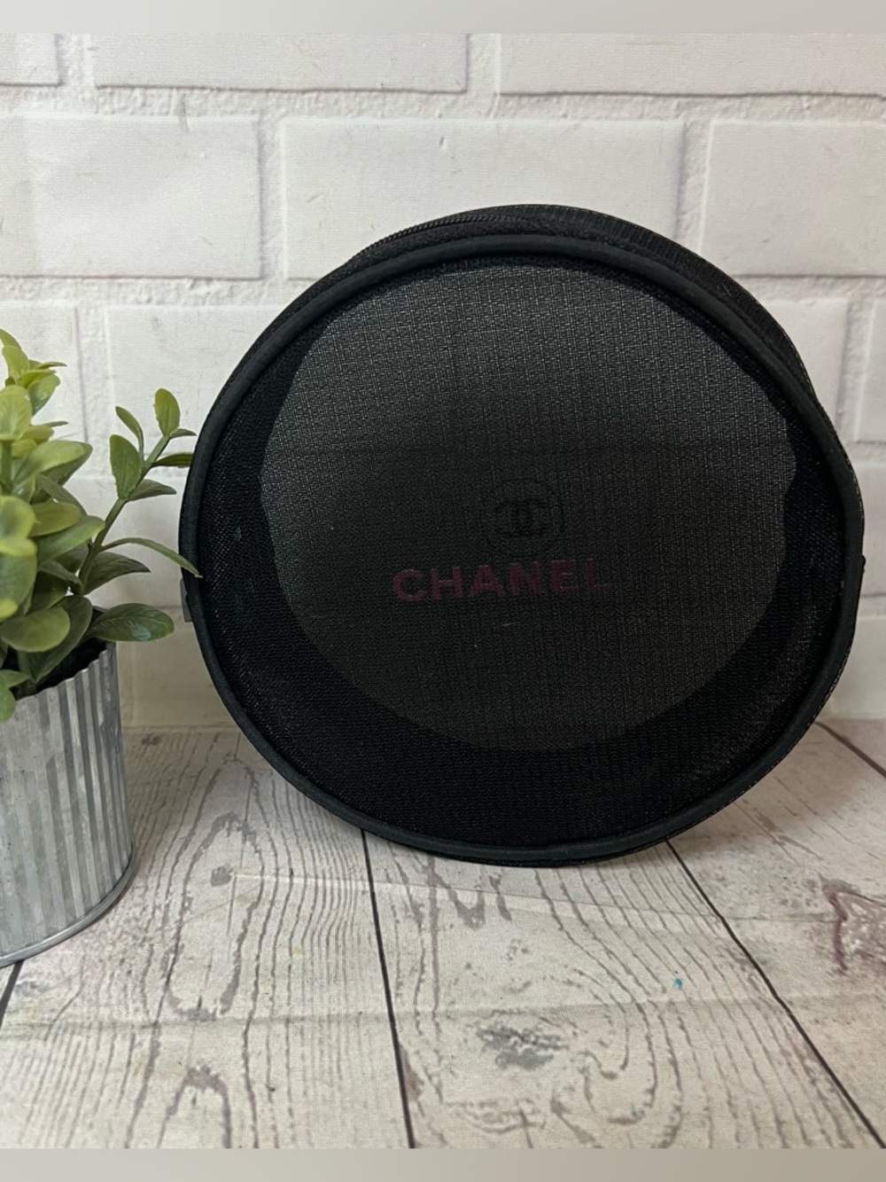 CHANEL Black Round Mesh Cosmetic Zip Bag.